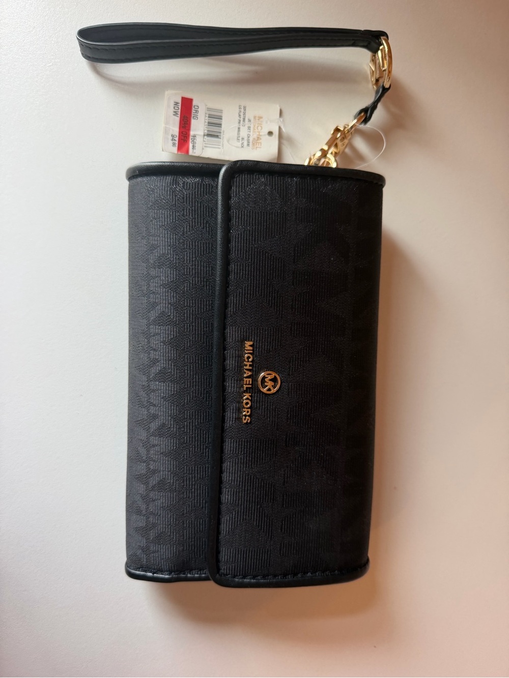 Michael Kors Black and Gold Signature Wristlet